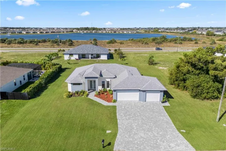 View of subject property with a large body of water
