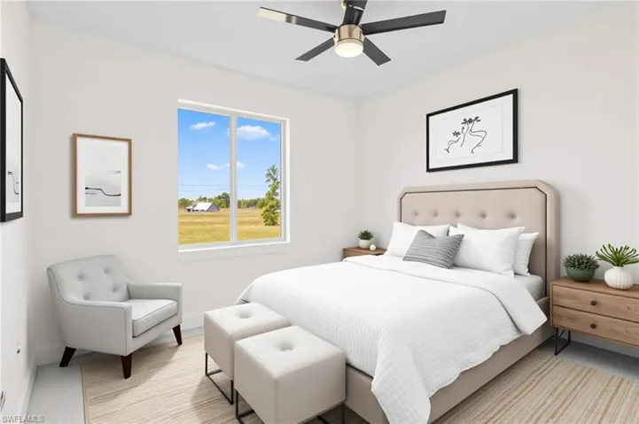 Bedroom with a ceiling fan and light tile patterned flooring