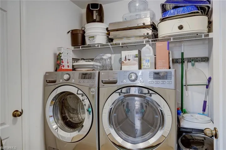 Laundry area featuring washer and clothes dryer