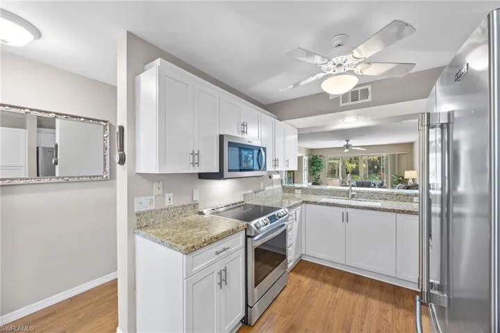 Kitchen with view to entryway