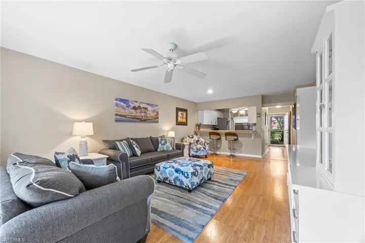 Living room with view to kitchen
