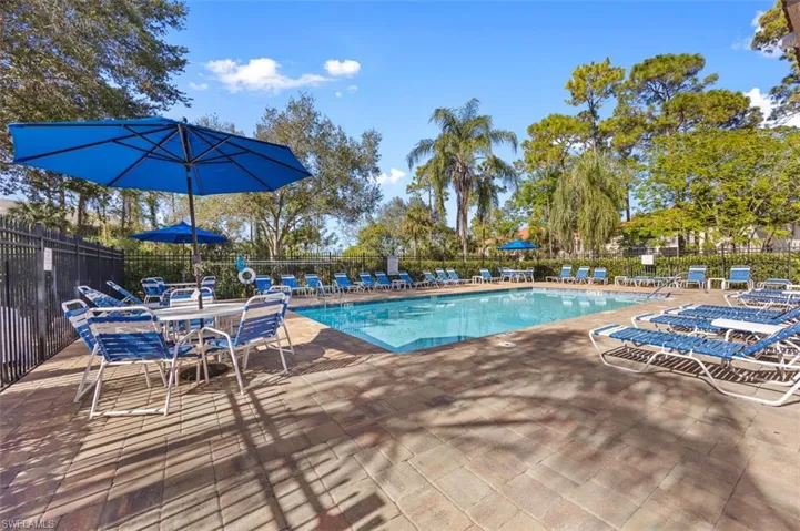 Community pool with plenty of seating