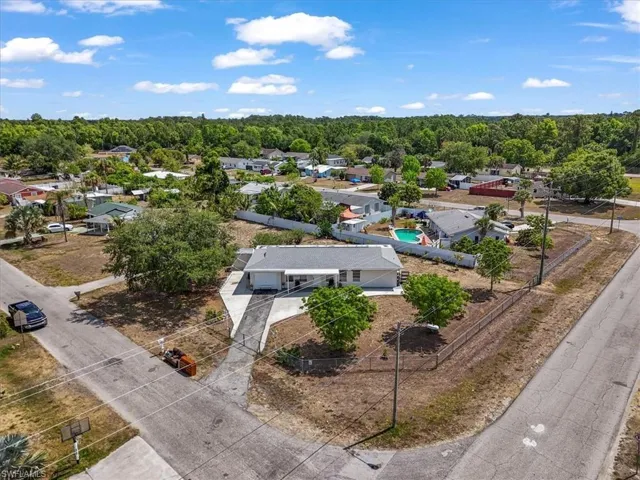 Birds eye view of property with a residential view