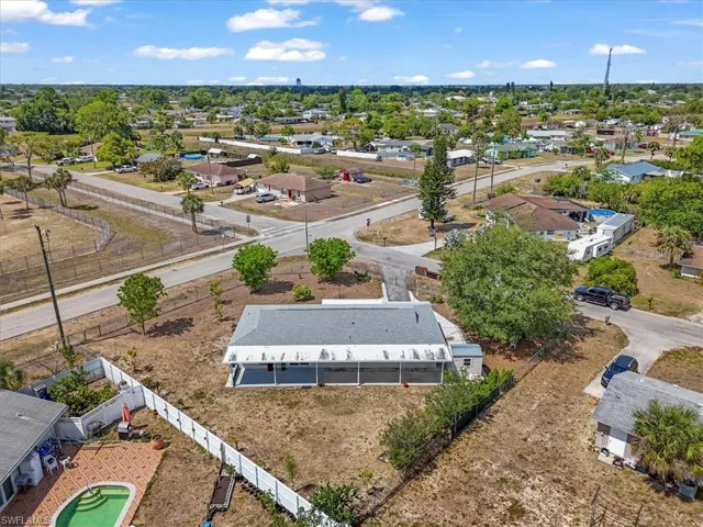 Birds eye view of property with a residential view
