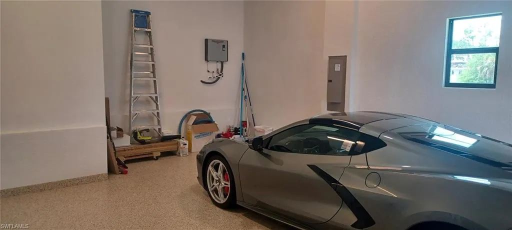 12'-6" garage ceiling with tankless water heater and extra storage space.