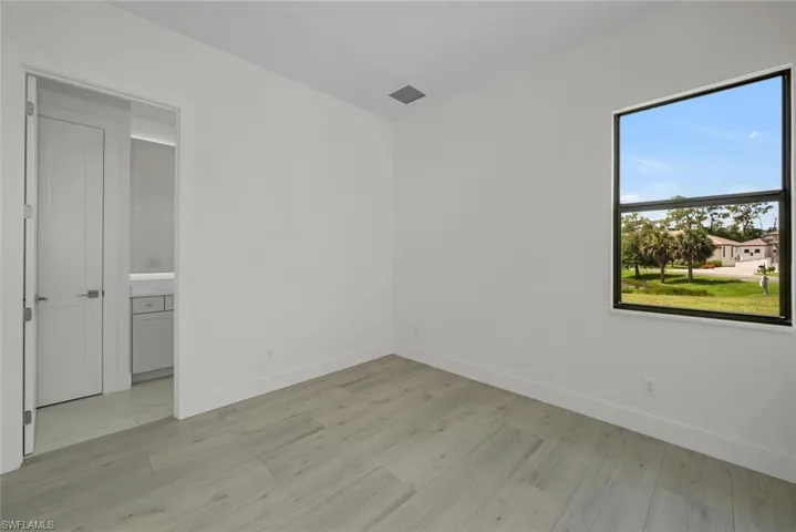 Unfurnished room featuring light hardwood / wood-style floors