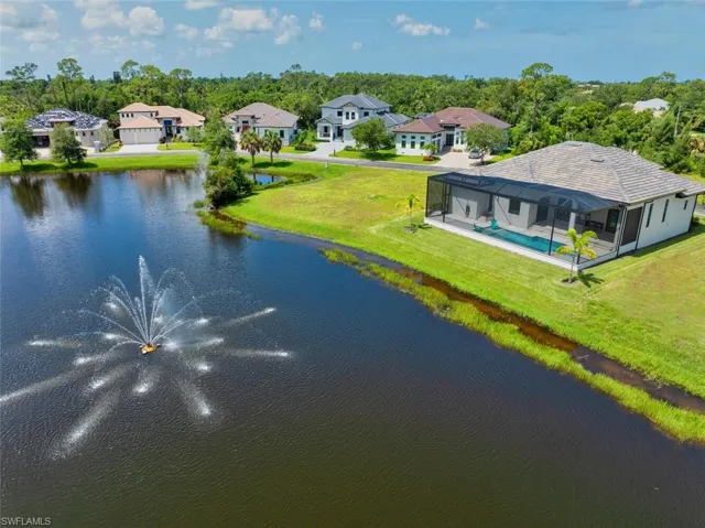 Aerial view with a water feature.