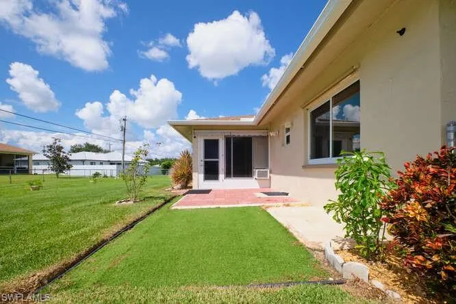 View of yard featuring a patio area and cooling unit