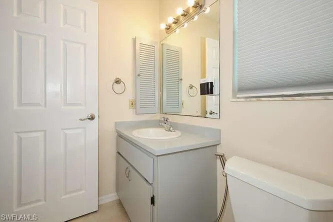 Bathroom featuring toilet and vanity