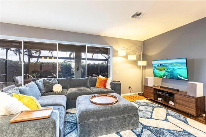 Living room featuring wood flooring