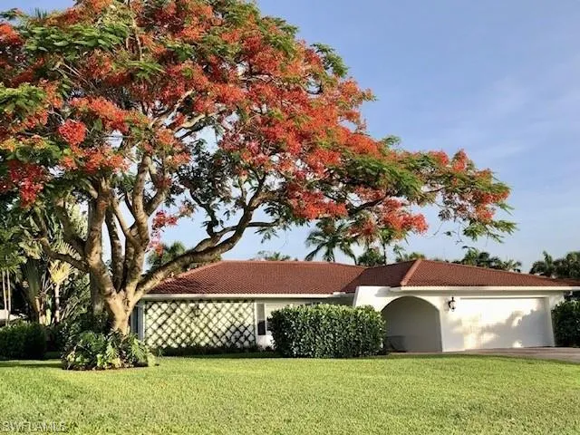 When in bloom, the stunning Royal Poinciana Tree welcomes you home!