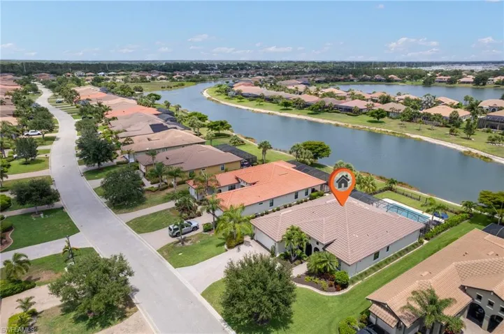 Aerial view of residential area with a large body of water