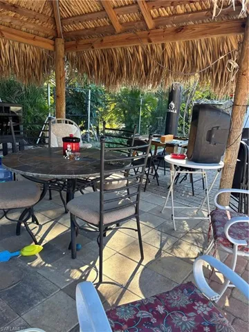 View of patio featuring outdoor dining area