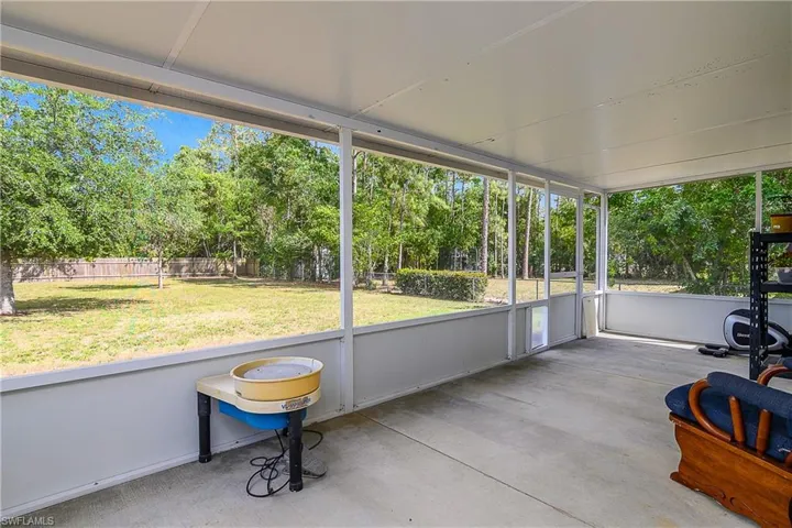Sunroom / solarium featuring a wealth of natural light
