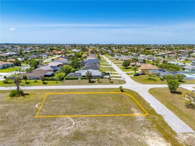Aerial perspective of suburban area with property parcel outlined