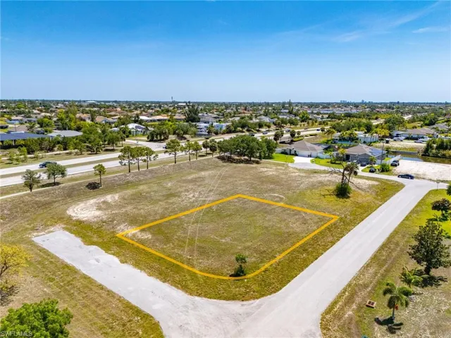 Aerial perspective of suburban area with property boundaries highlighted