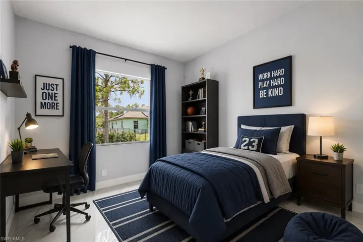 Bright room featuring a large window, tiled flooring, built-in shelving, and light gray walls