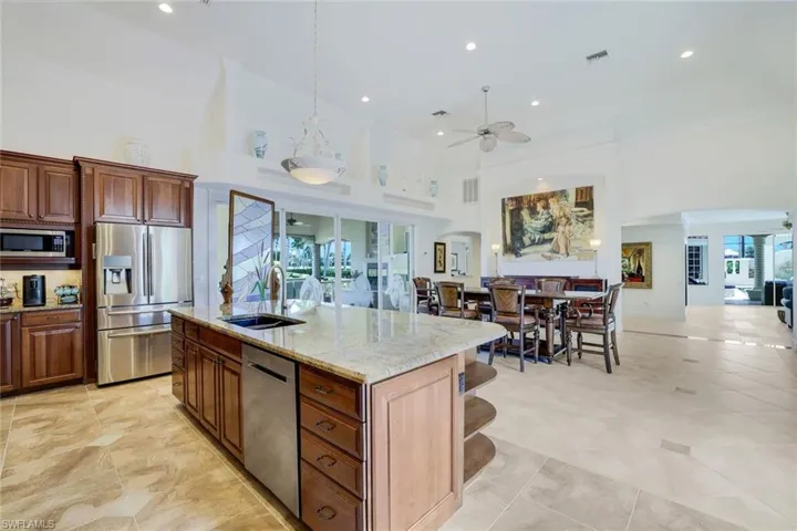 Large island has more storage. Granite countertops.