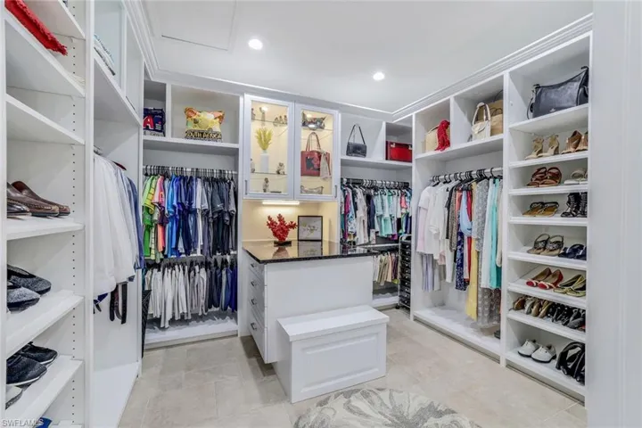 Amazing walk in custom closet in master wing.