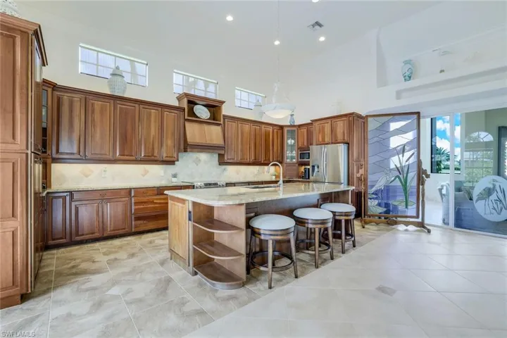 Endless wood cabinetry. Natural light spills in here.