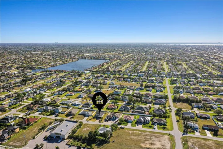 Aerial view with a residential view and a water view