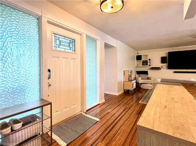 Entryway with wood-type flooring