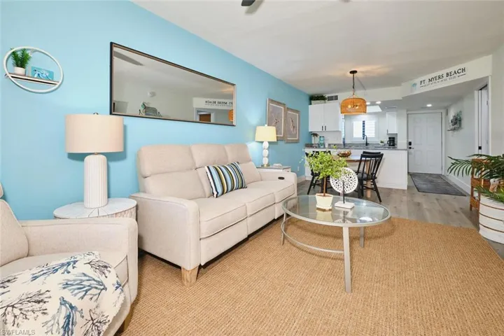 Living room with light wood-style flooring