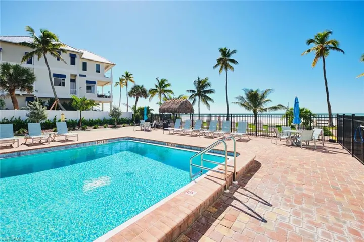 Community pool featuring a patio area
