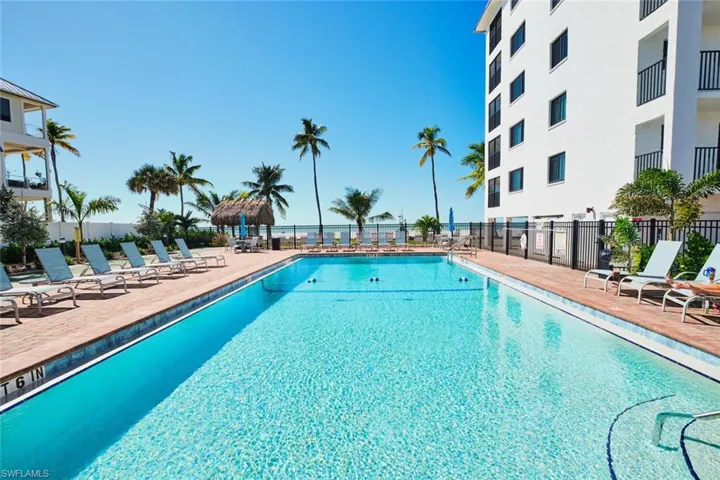 Community pool featuring a patio area