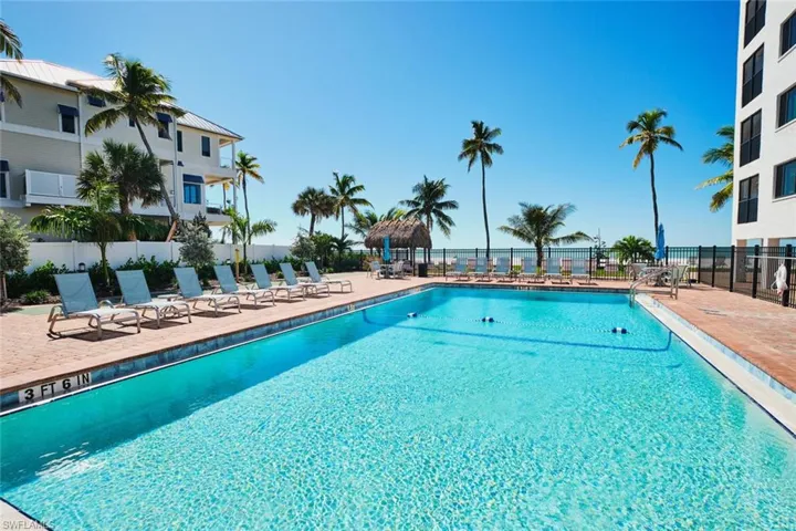 Community pool with a patio area