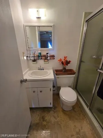 The master bathroom is cozy and functional.