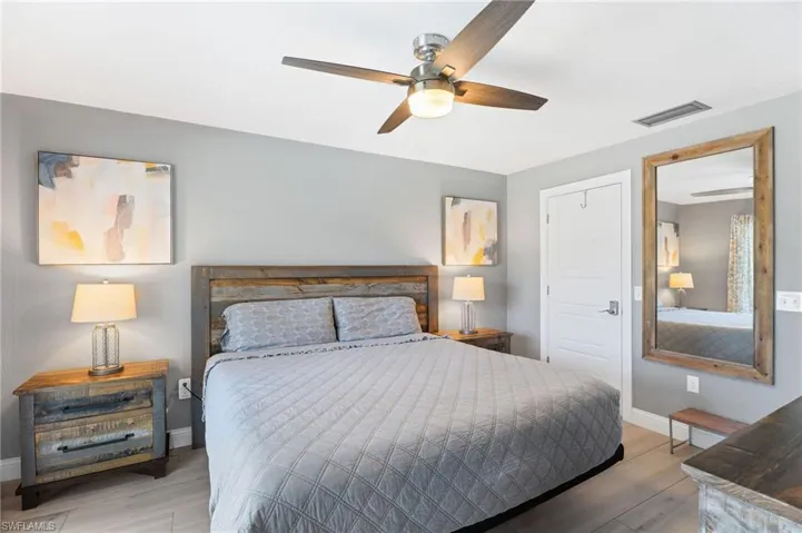 Master Bedroom featuring tile flooring and ceiling fan