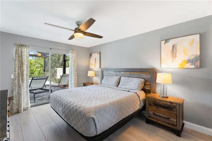 Master Bedroom with sliding glass doors to pool area