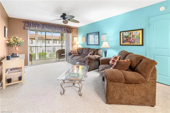 Living room with sliders leading to your lanai