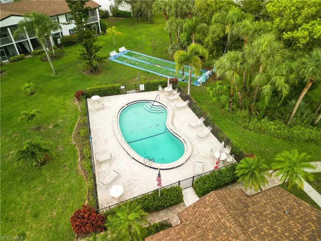 Community pool featuring a patio area