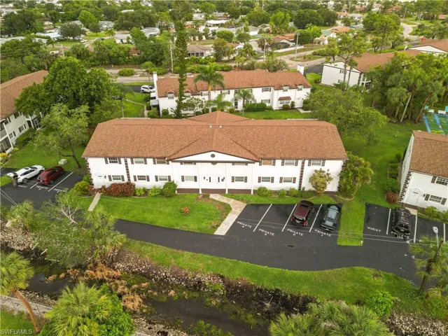 Aerial view of the front of your building with your parking spot just outside the front door.