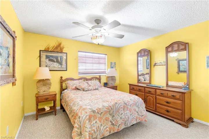 Guest bedroom located at the front of the home