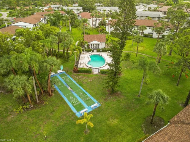 Aerial view of the clubhouse, pool and shuffleboard