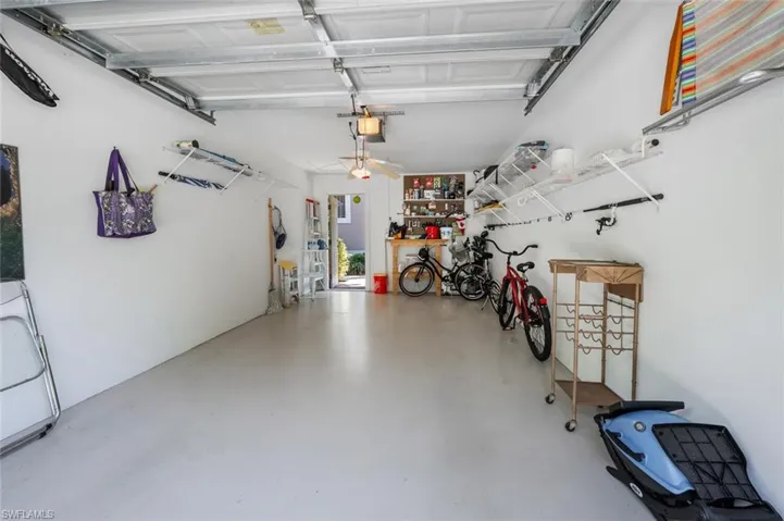 Garage featuring a garage door opener