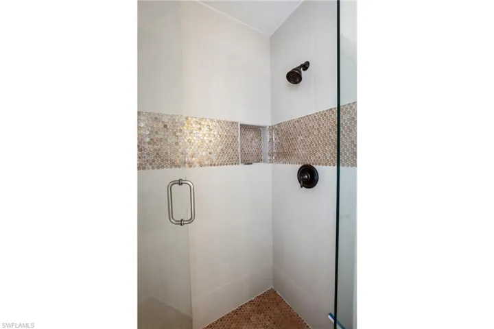Bathroom featuring a stall shower