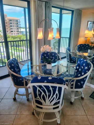 Game or work area with printer, bay views and open balcony