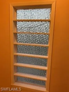 Beautiful Window allows light in enclosed entry