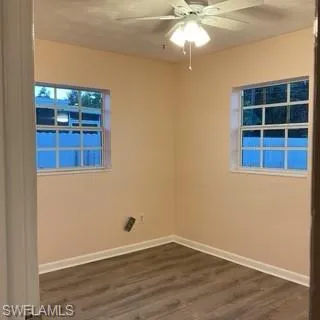 3rd Bedroom. Freshly painted, light room with new LVP flooring!