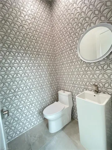 Half bath featuring toilet