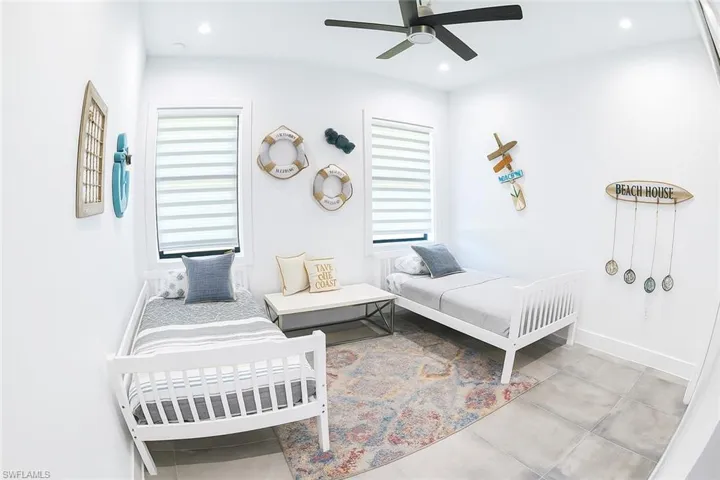 Bedroom with recessed lighting and a ceiling fan