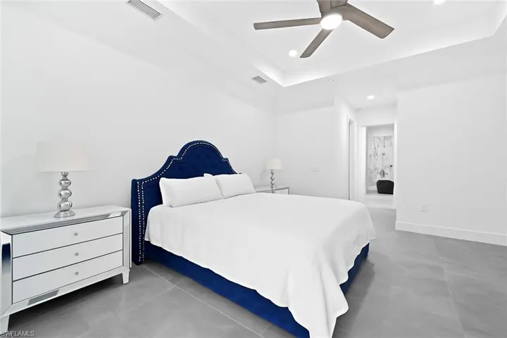 Bedroom with recessed lighting and a ceiling fan