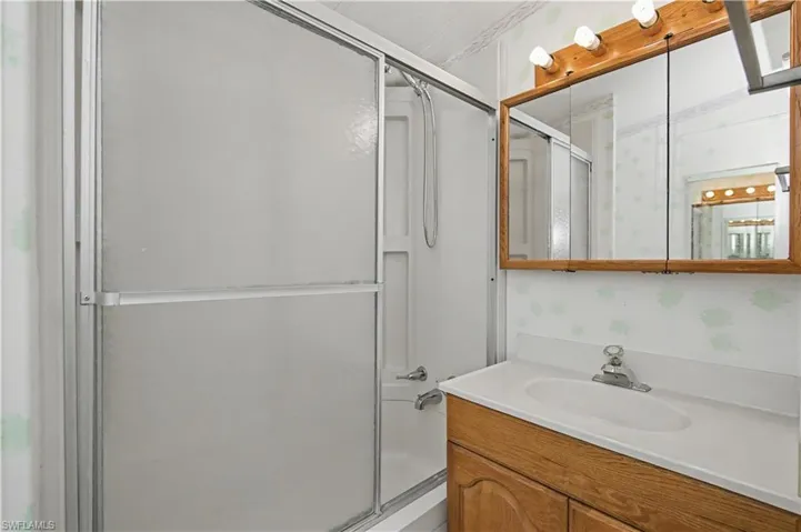 Full bathroom featuring vanity