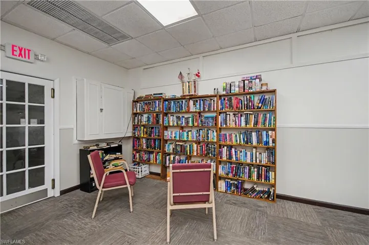 Living area featuring a paneled ceiling