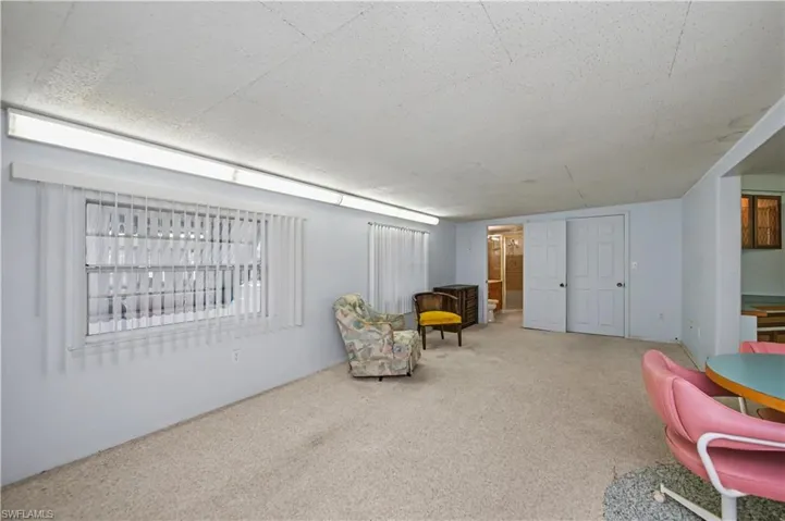 Living area with carpet flooring