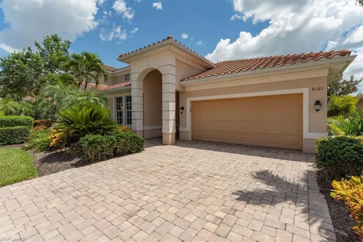Spacious driveway with multiple vehicle capacity.